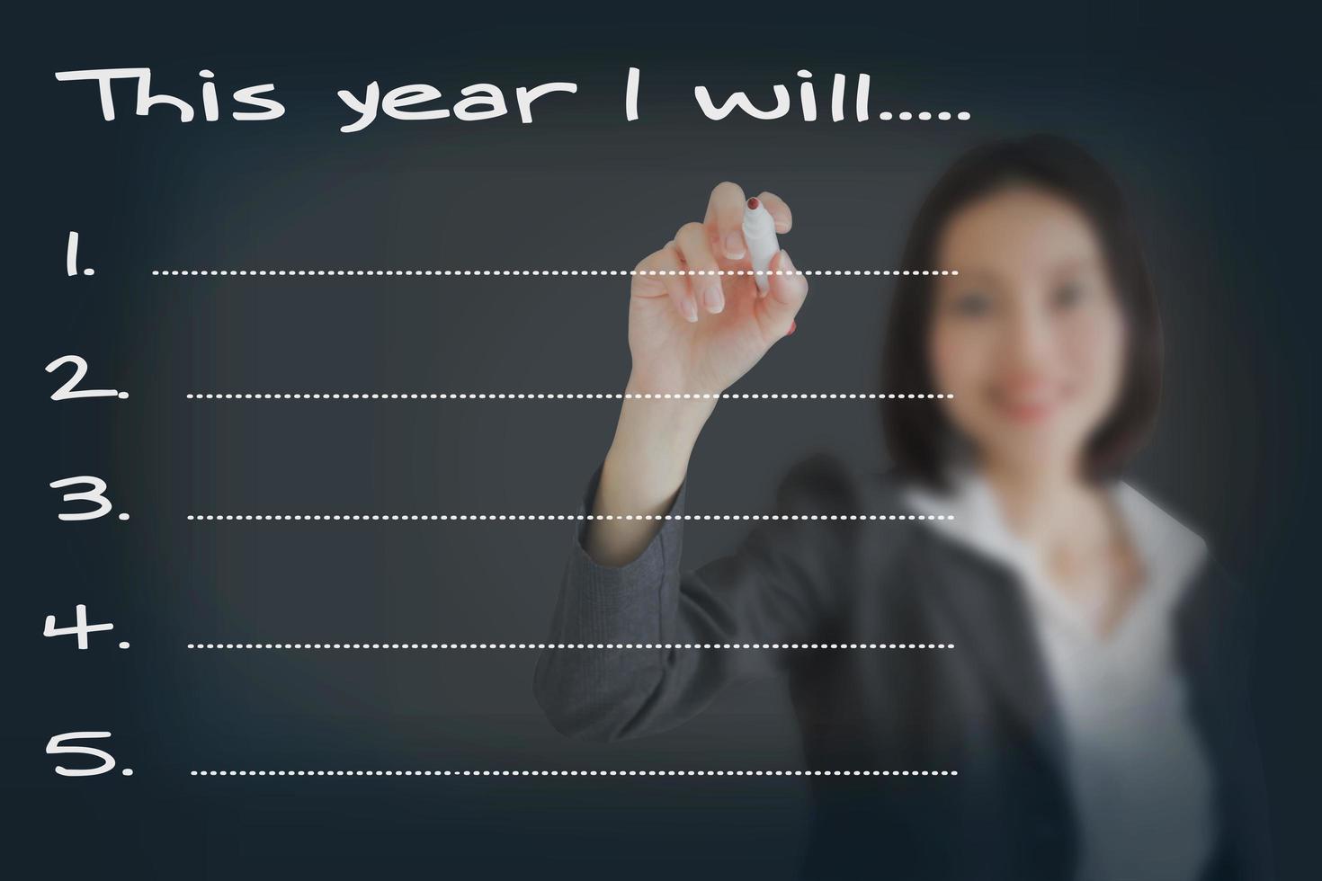 Beautiful businesswoman resolutions for  New Year Goals List photo