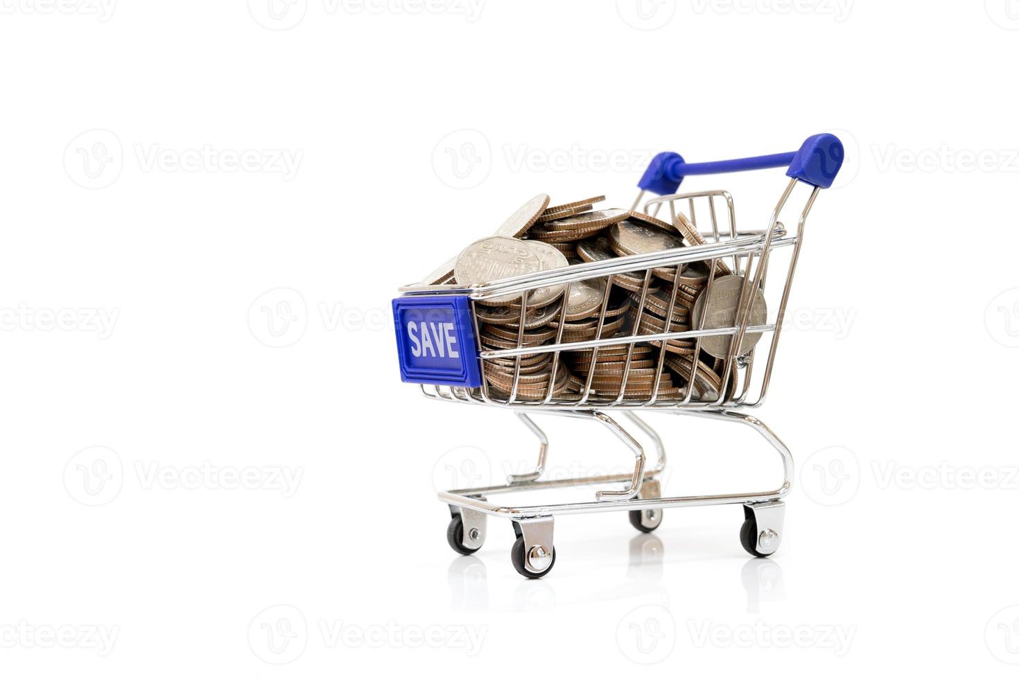 Save concept with shopping cart with full of coin. photo