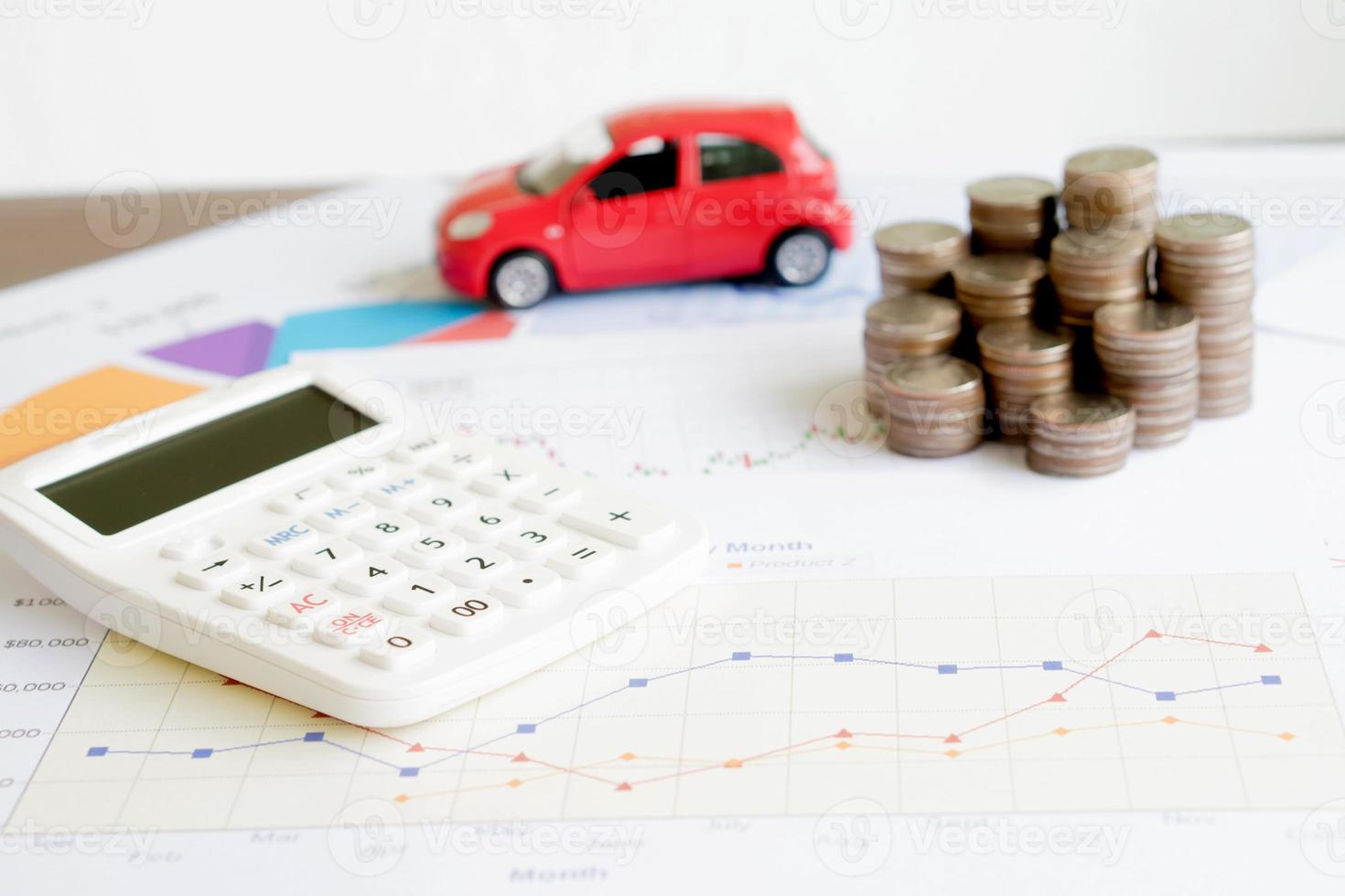 Car expenses calculate with notes and toy car photo