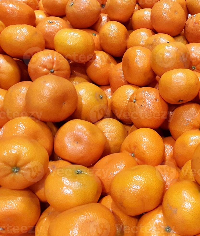 Fresh mandarin oranges texture photo