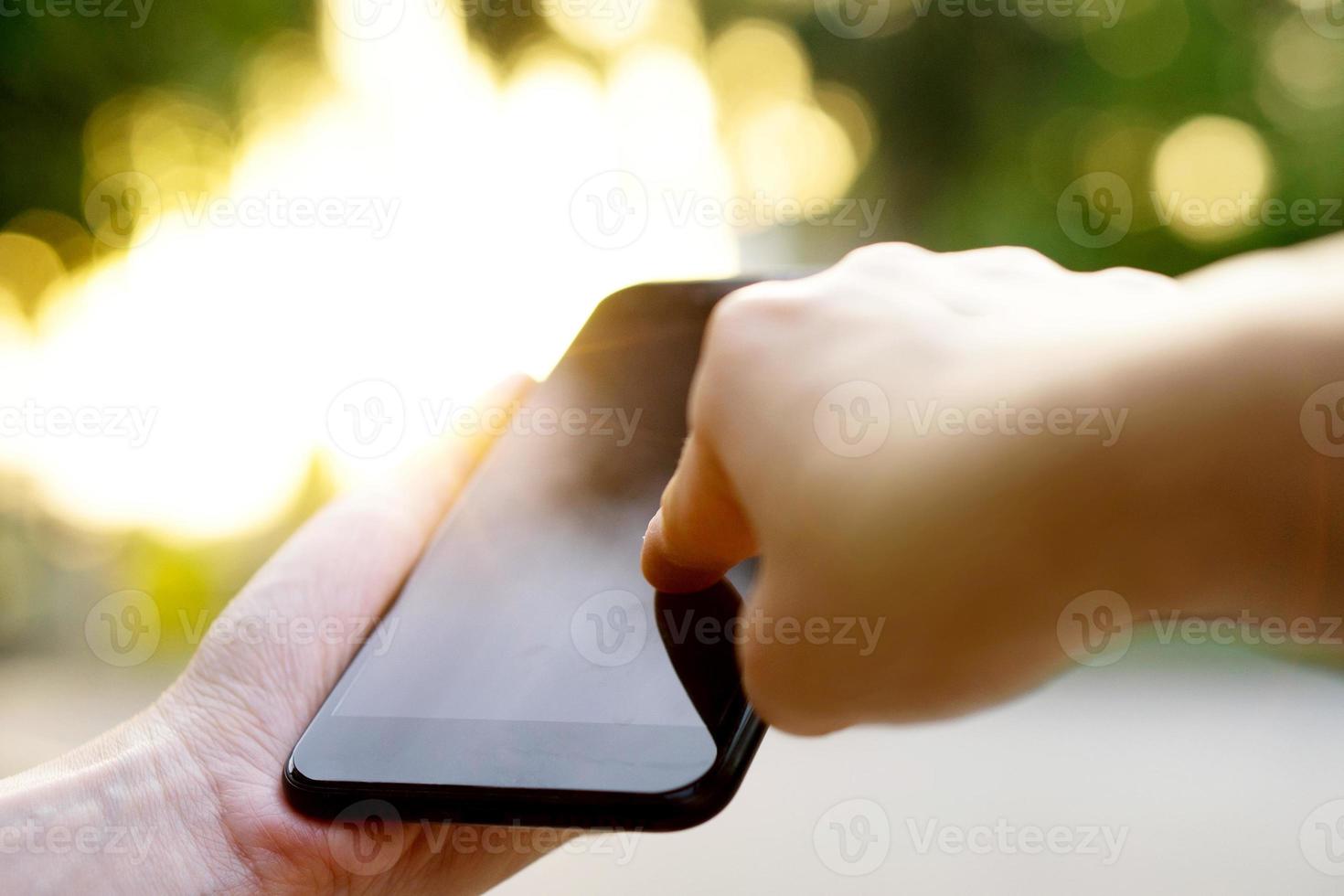 Woman using her Mobile Phone photo