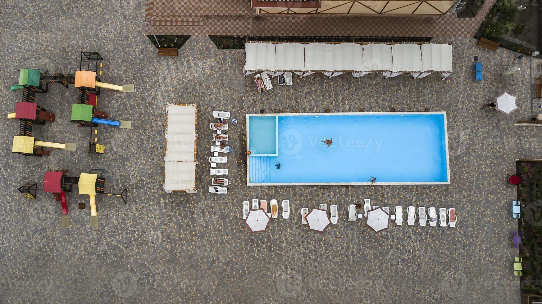 Swimming Pool viewed from above. Top down view photo