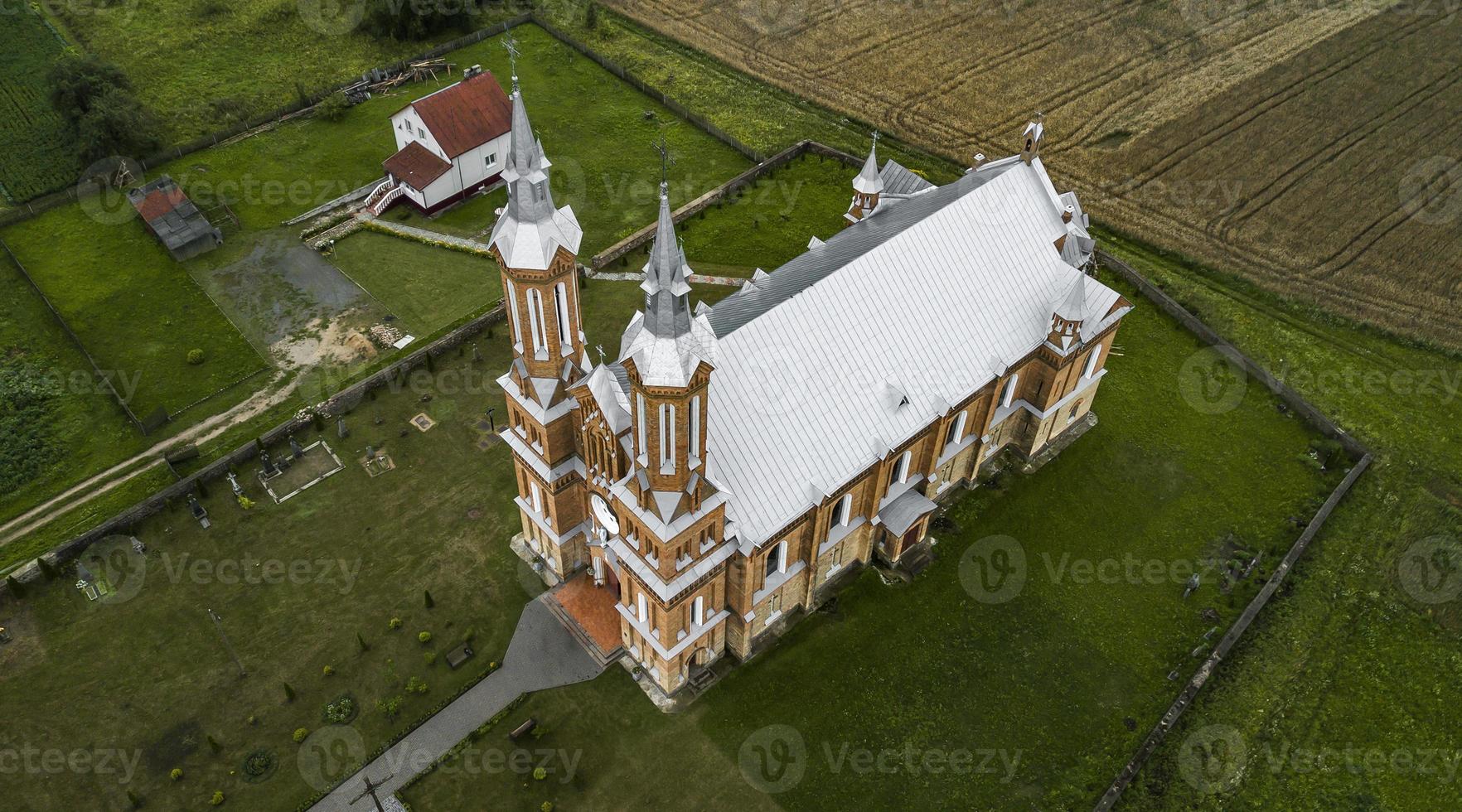 the old Catholic Church is a top view of the drone aerial photography photo