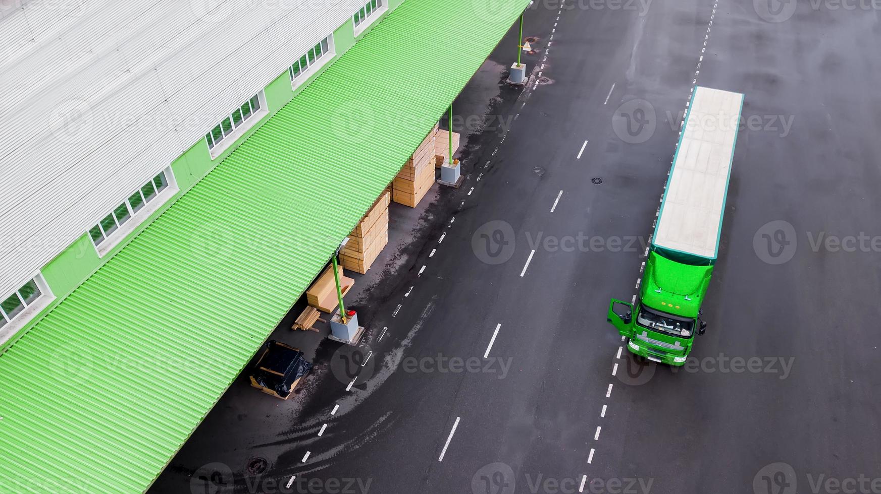 the truck is waiting for loading at the logistics center photo