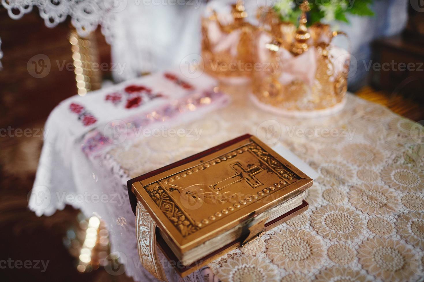 Bible on altar table. Faith and religion concept. Preaching background. Church interior. Lord's table concept. Holy holidays and Christmas concept. Christianity tradition. photo