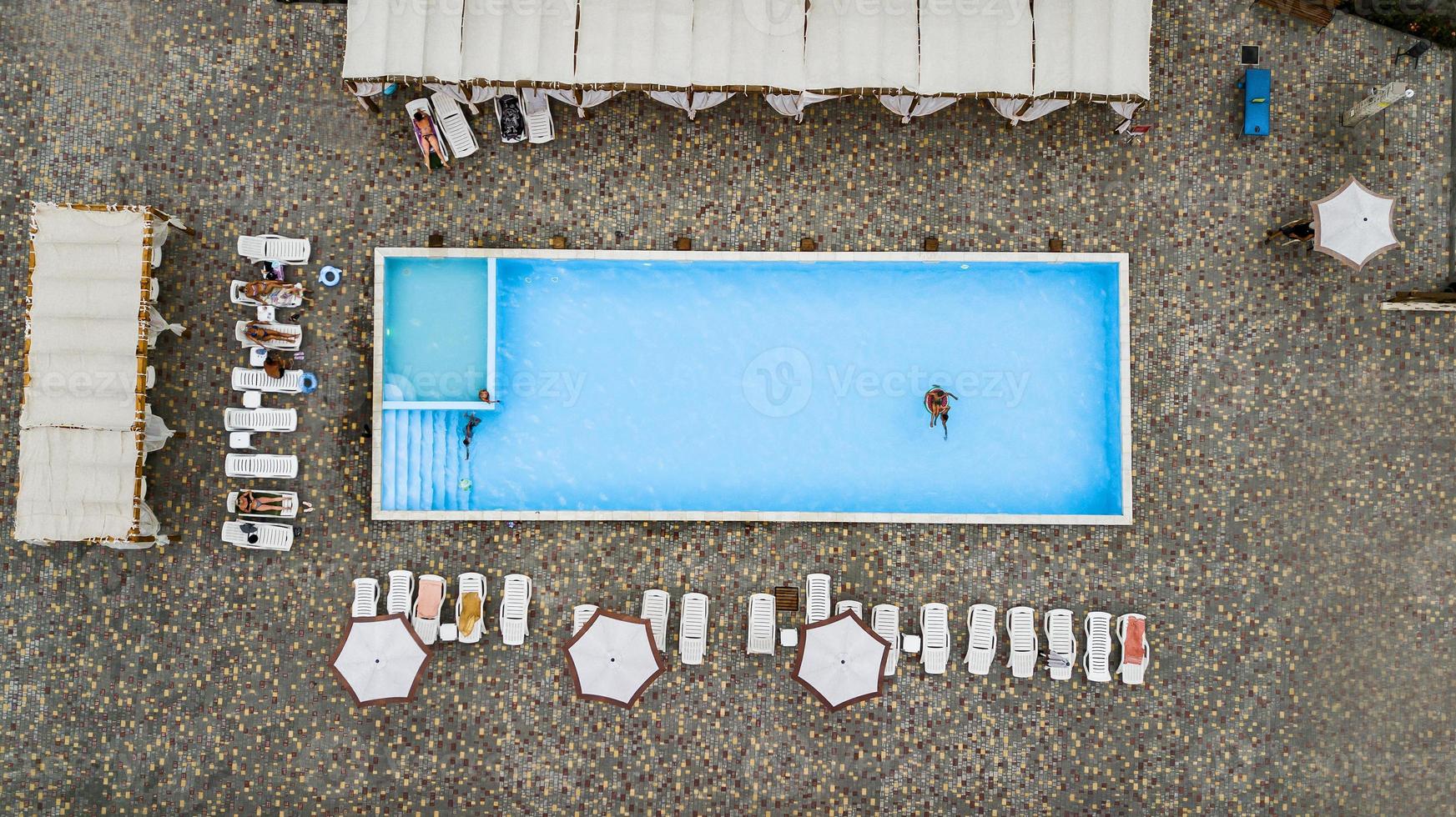 Swimming Pool viewed from above. Top down view photo