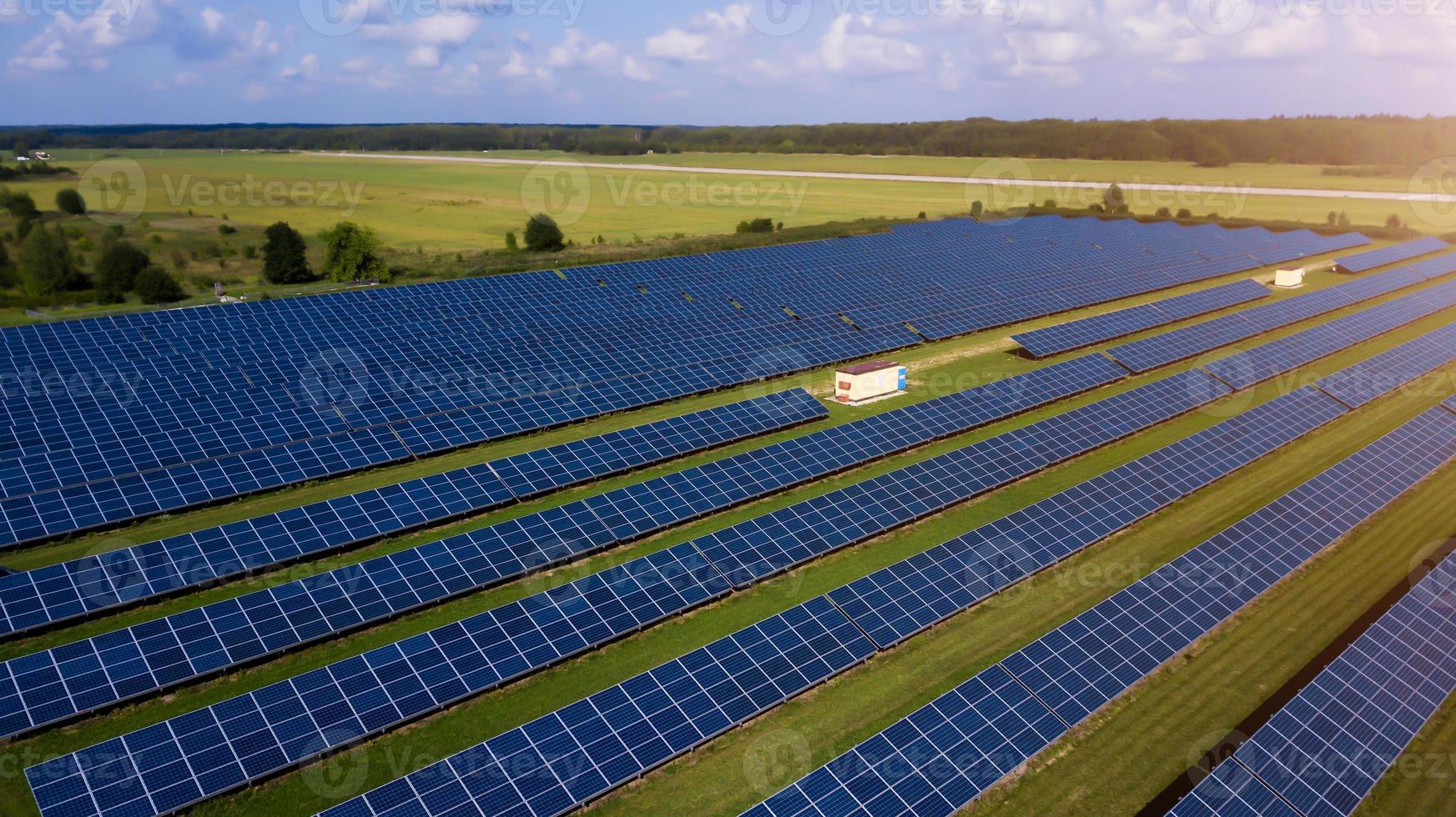 Aerial top view of a solar pannels power plant. Renewable energy concept photo