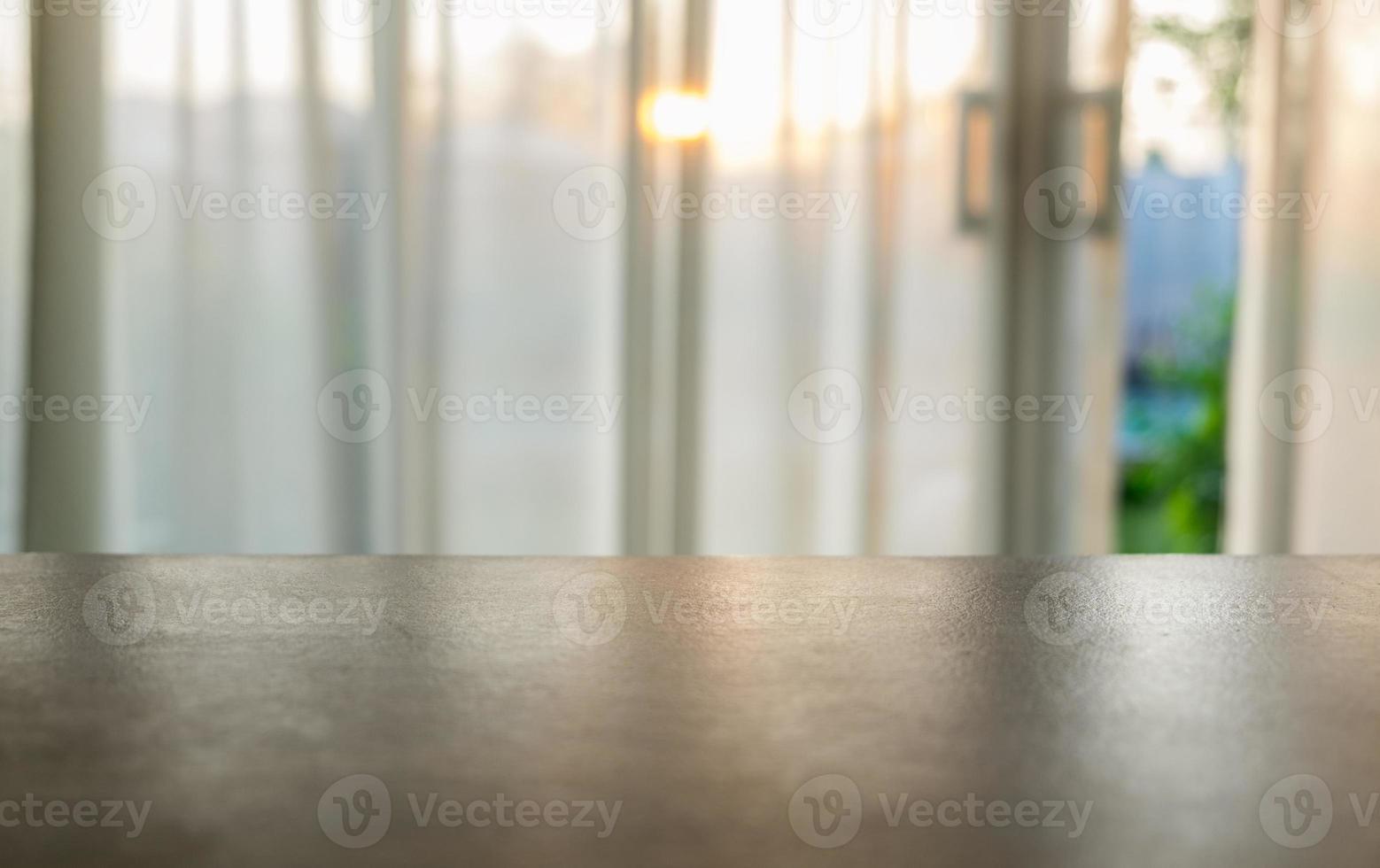 Wood table top on blurred soft curtain photo