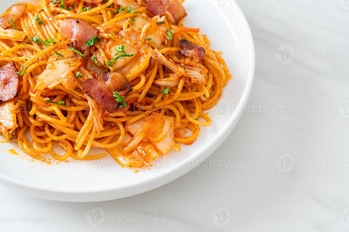 stir-fried spaghetti with kimchi and bacon photo