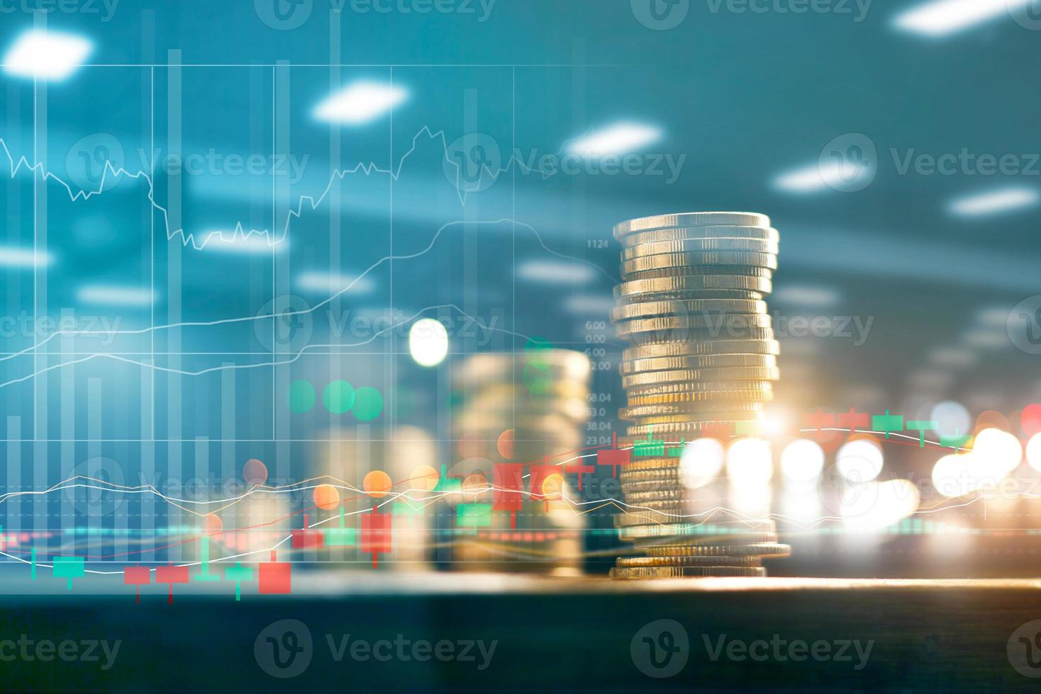 Finance and business investment concept. Graph and rows with statistic growth of coins on table. photo