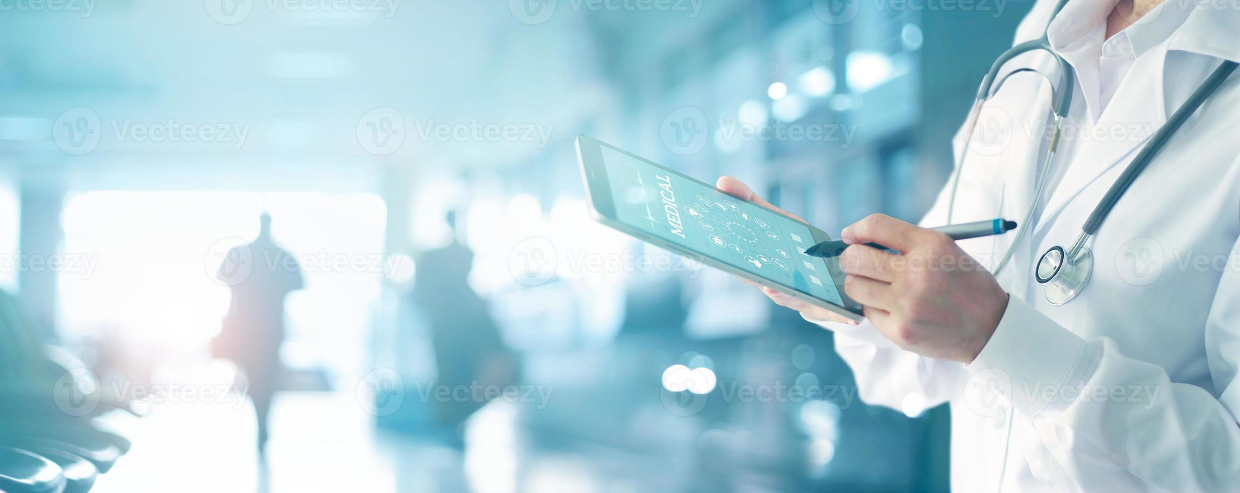 Medicine doctor and stethoscope touching icon medical network connection with modern interface on digital tablet in hospital background. Medical technology network concept photo