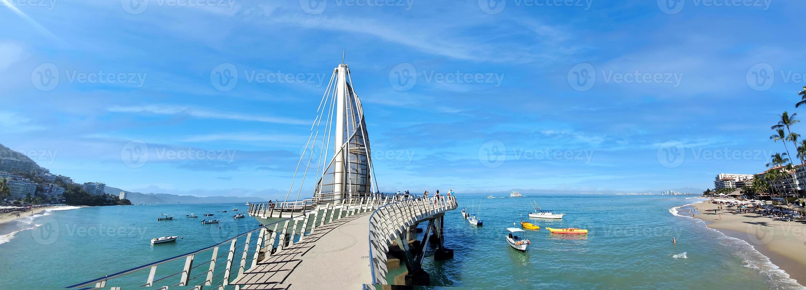 Playa De Los Muertos beach and pier close to famous Puerto Vallarta Malecon, the city largest public beach photo