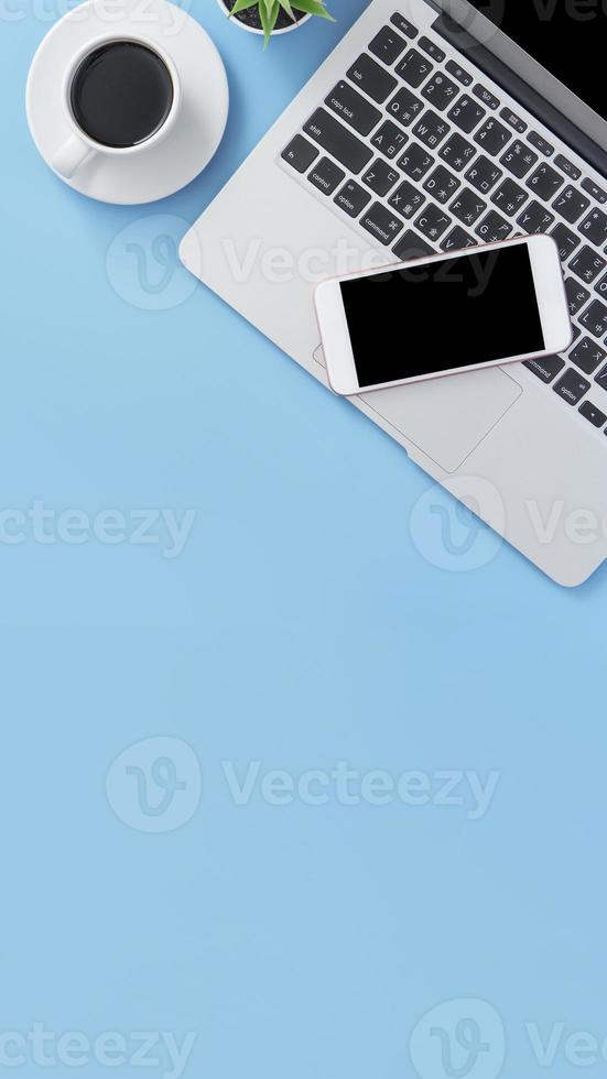 Business concept, relaxation in working time, drinking coffee taking a break on clean light blue office table, copy space, flat lay, top view, mockup photo
