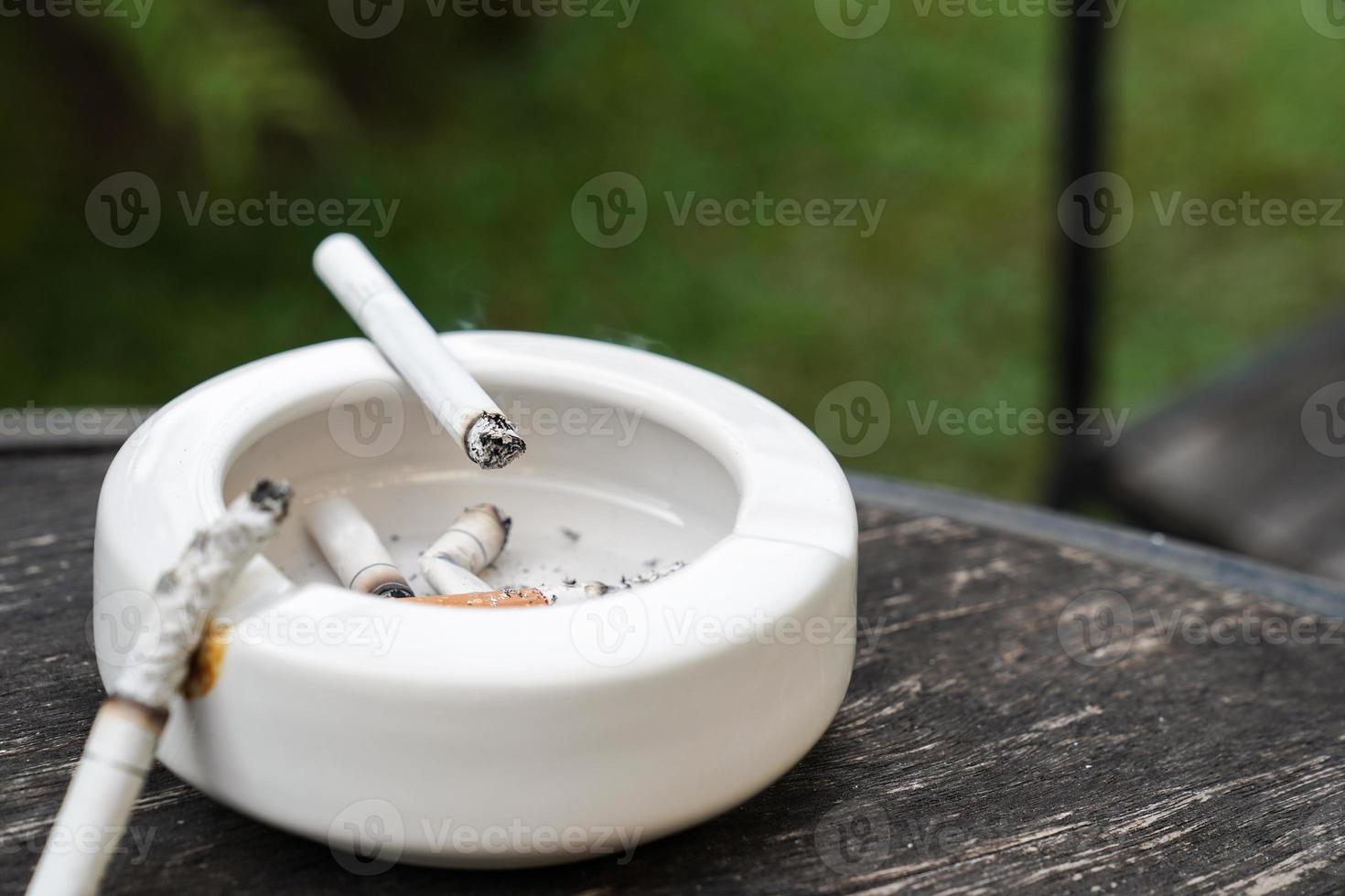 close up cigarette and ashtray. photo