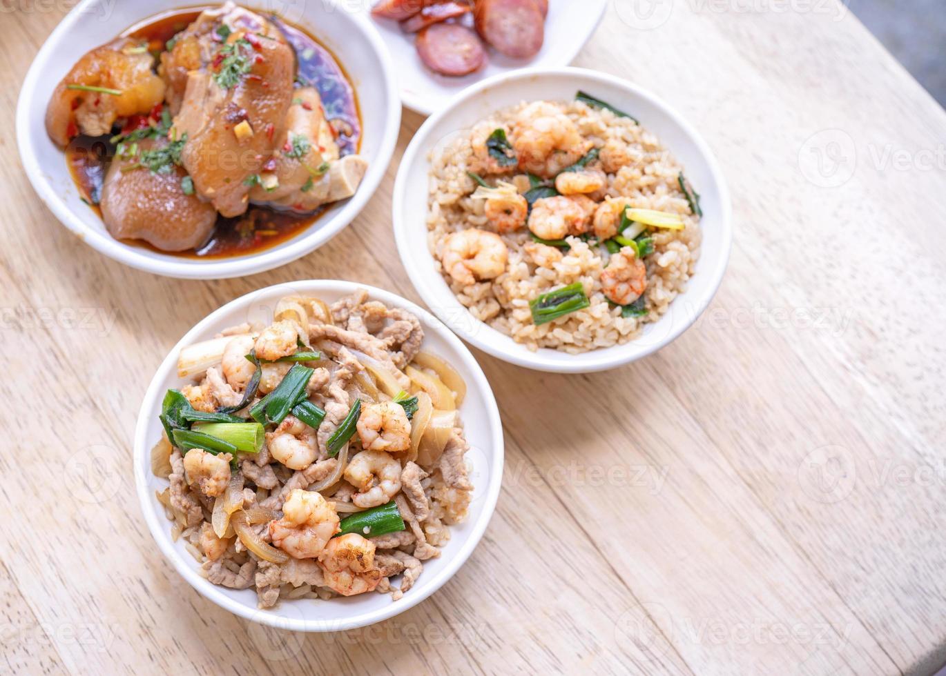 Braised shrimp over rice - Taiwan famous traditional street food. Soy-stewed prawn on cooked rice. Travel concept, top view, copy space, close up photo
