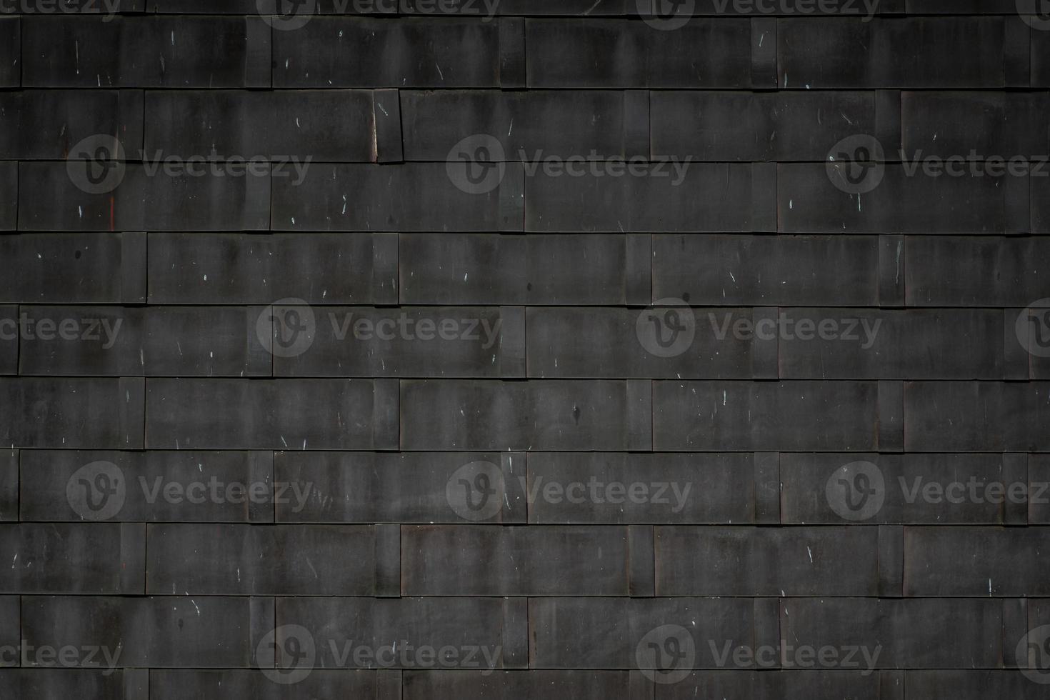 the Black raw square rubber roof pattern for background in some place in Thailand. photo