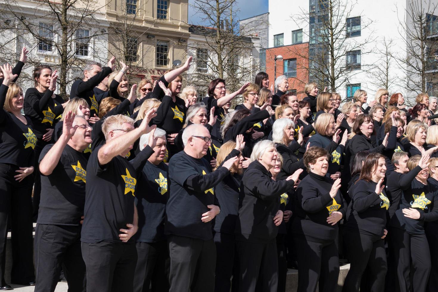 Cardiff, Wales, UK, 2014. The Rock Choir supporting Sport Relief day and entertaining the crowds photo