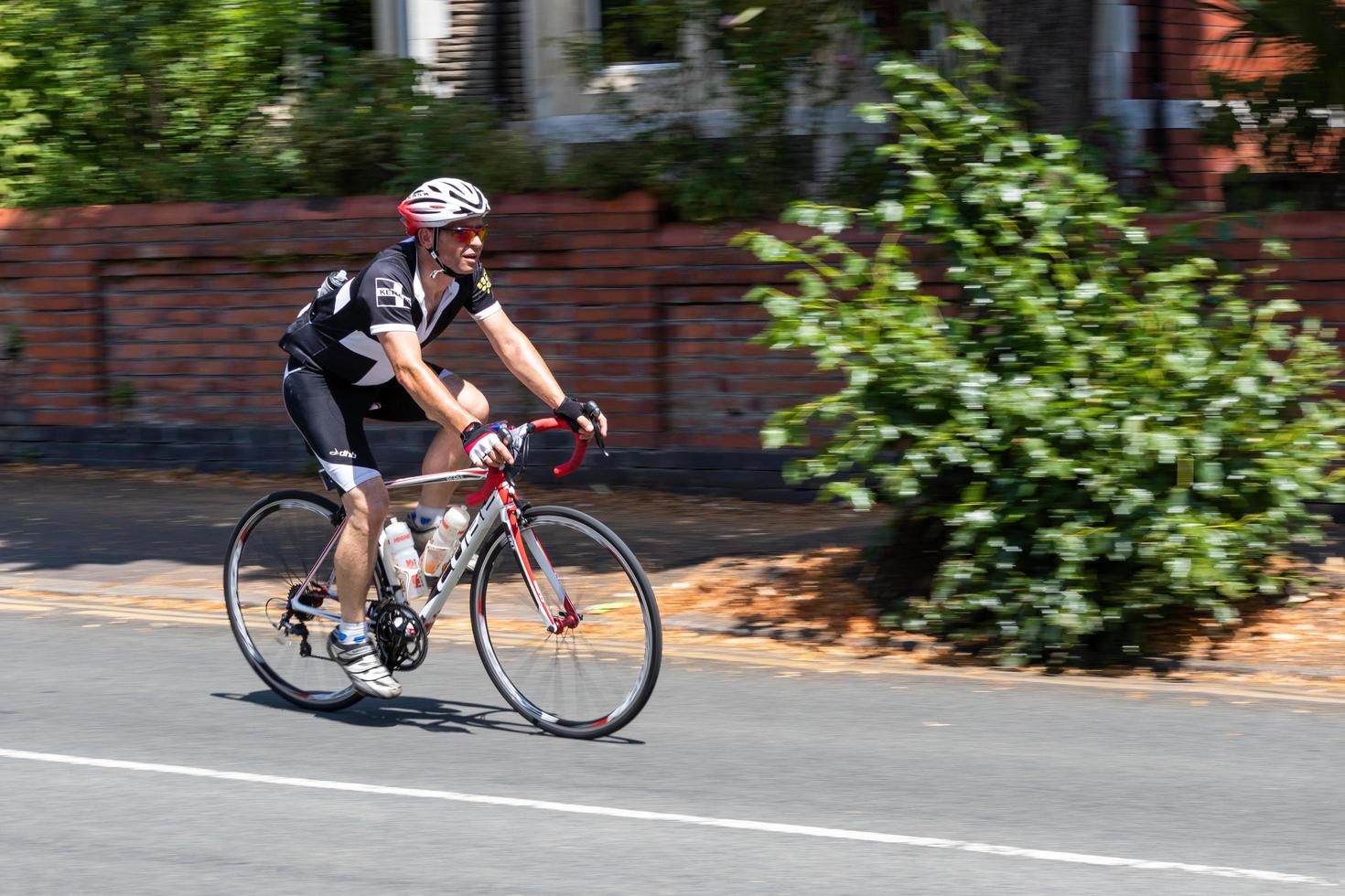 CARDIFF, WALES, UK, 2018. Cyclist participating in the Velothon Cycling Event in Cardiff Wales on July 8, 2018. One unidentified person photo