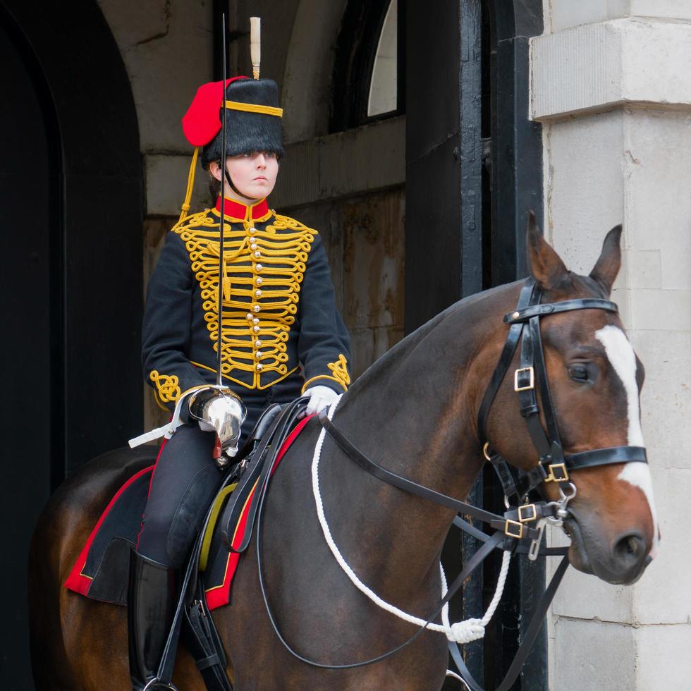 LONDON, UK, 2017. Kings Troop Royal Horse Artillery in Whitehall London on July 30, 2017. Unidentified woman photo