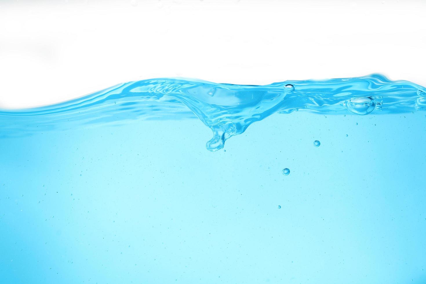 Blue surface water and air bubble isolated on white background photo