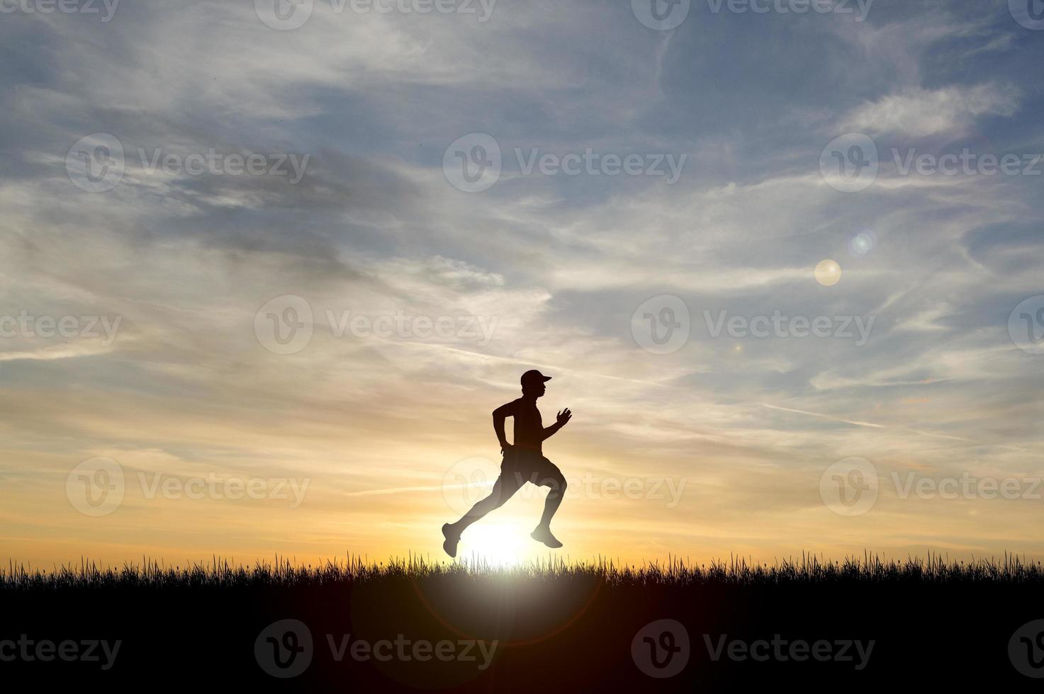 Running man silhouette in sunset time.  silhouette for a runner training in the evening. Sunsets photo