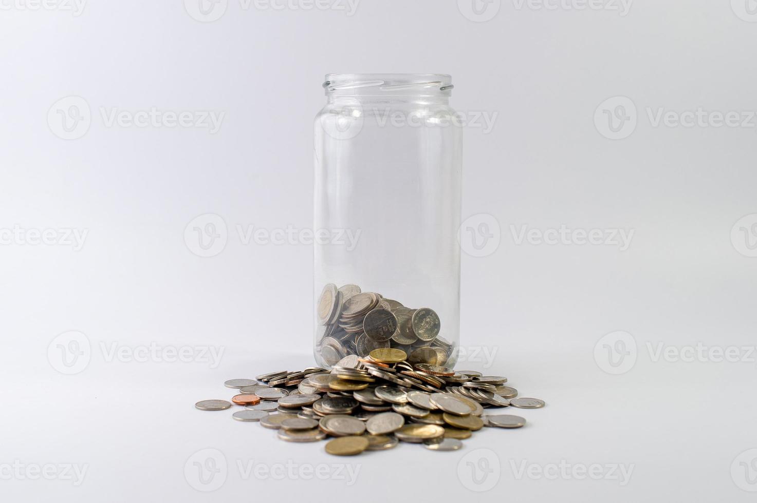 Saving money, saving money for the future ahead of life. And silver on a white background photo