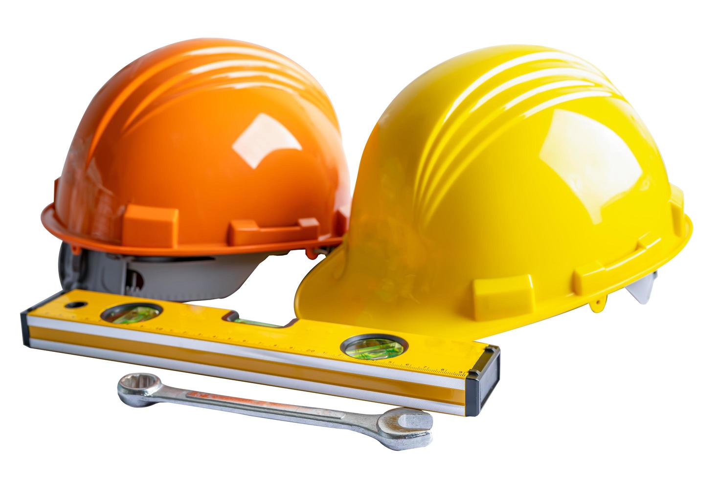 Safety first hard helmet hat and engineer tool with copy space, engineering construction and architecture concept. photo