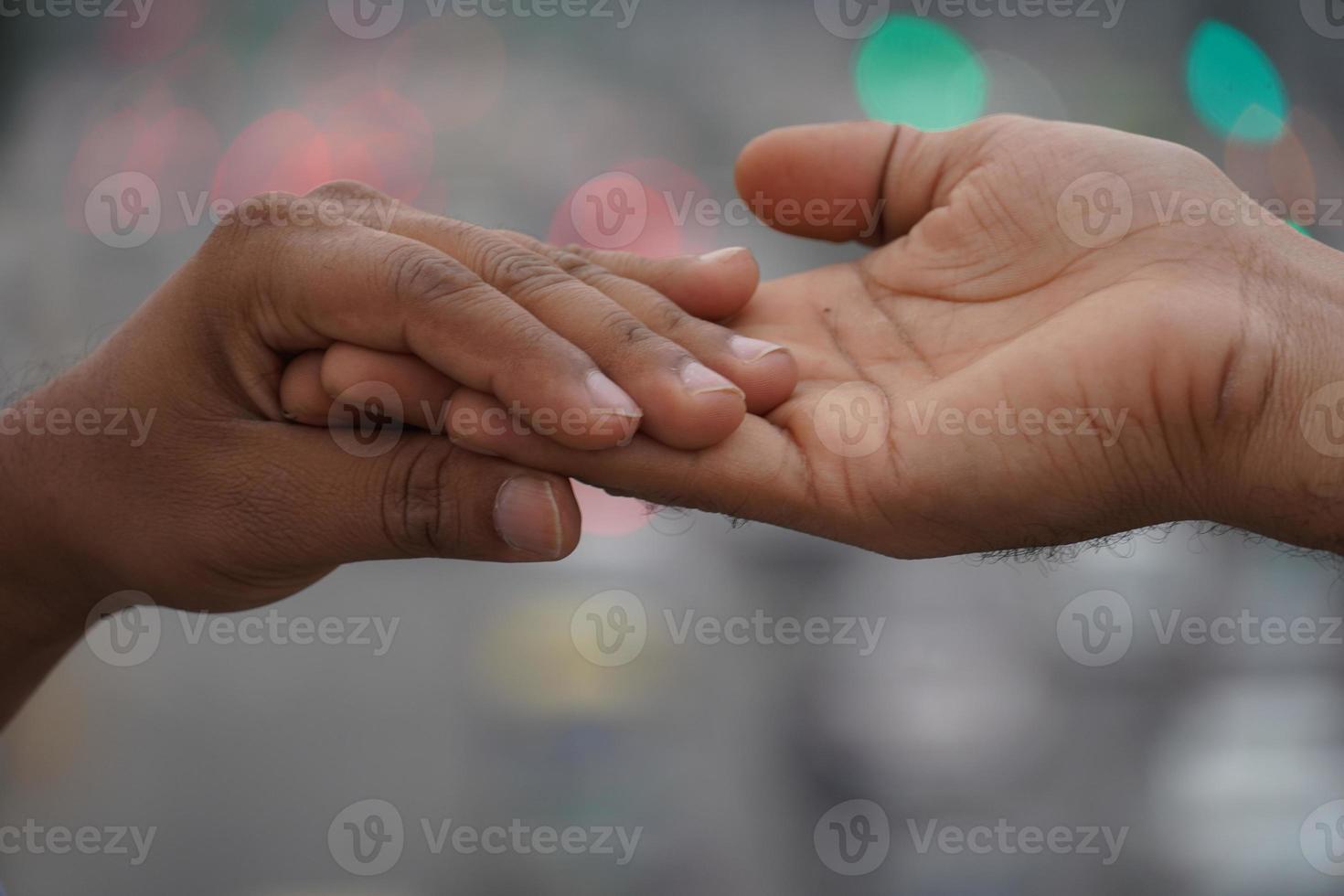 Two hands together Caring concept image photo