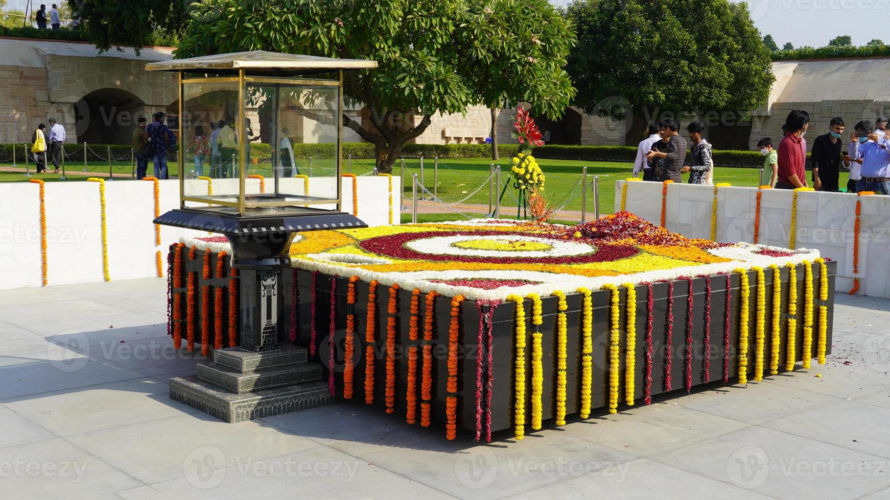 Raj Ghat is a memorial to Mahatma Gandhi. It is a black marble platform that marks the spot of Mahatma Gandhi's cremation. photo