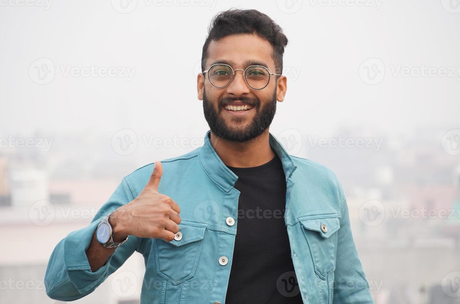a man showing thumbs up image photo