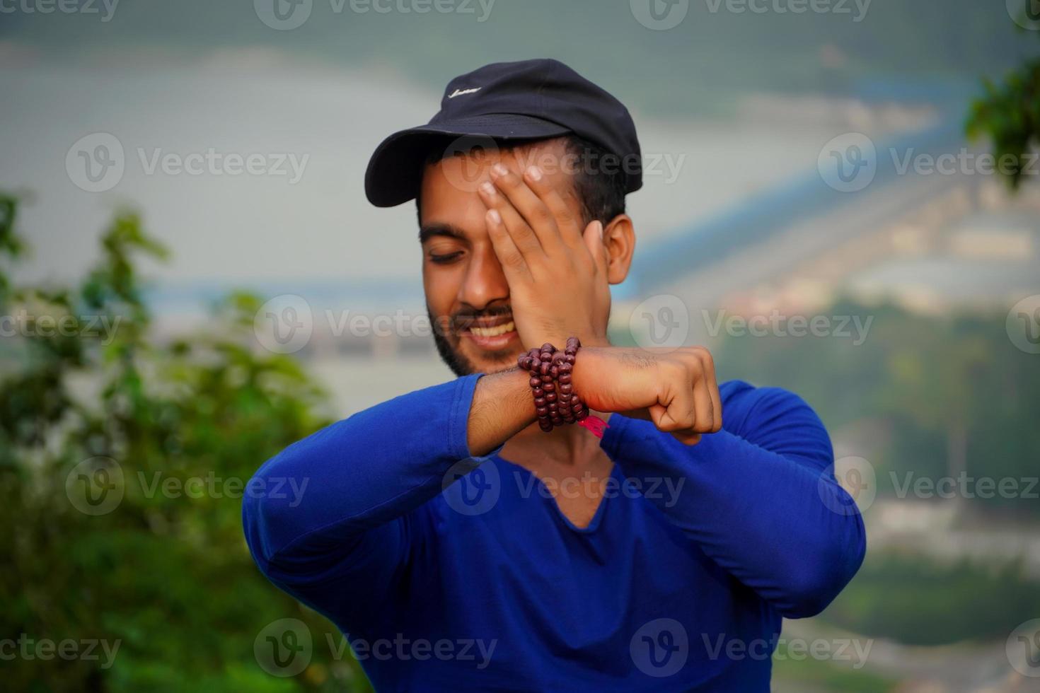young man showing his hand photo