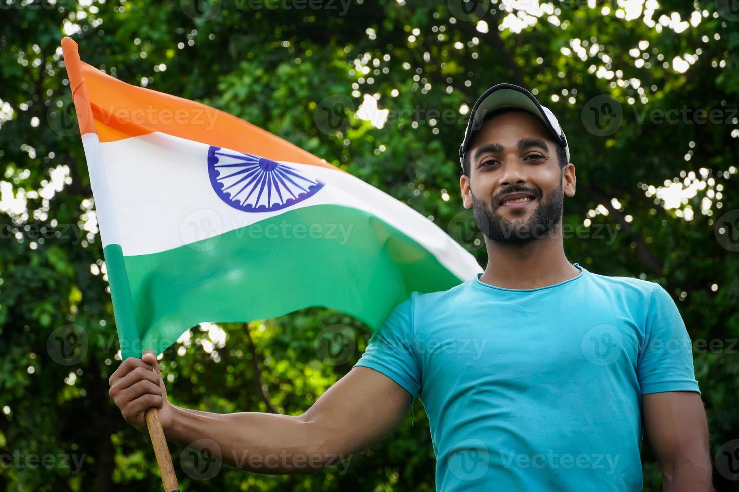 Young indian man celebrating indian republic day or independence day photo