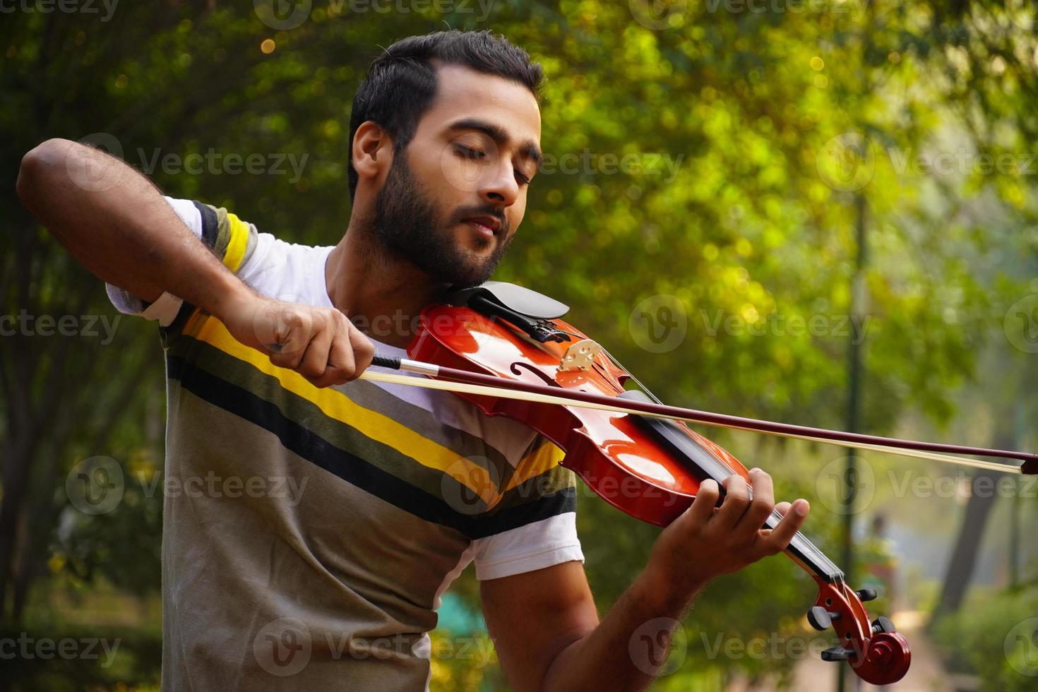 musician playing violin. Music and musical tone concept. photo