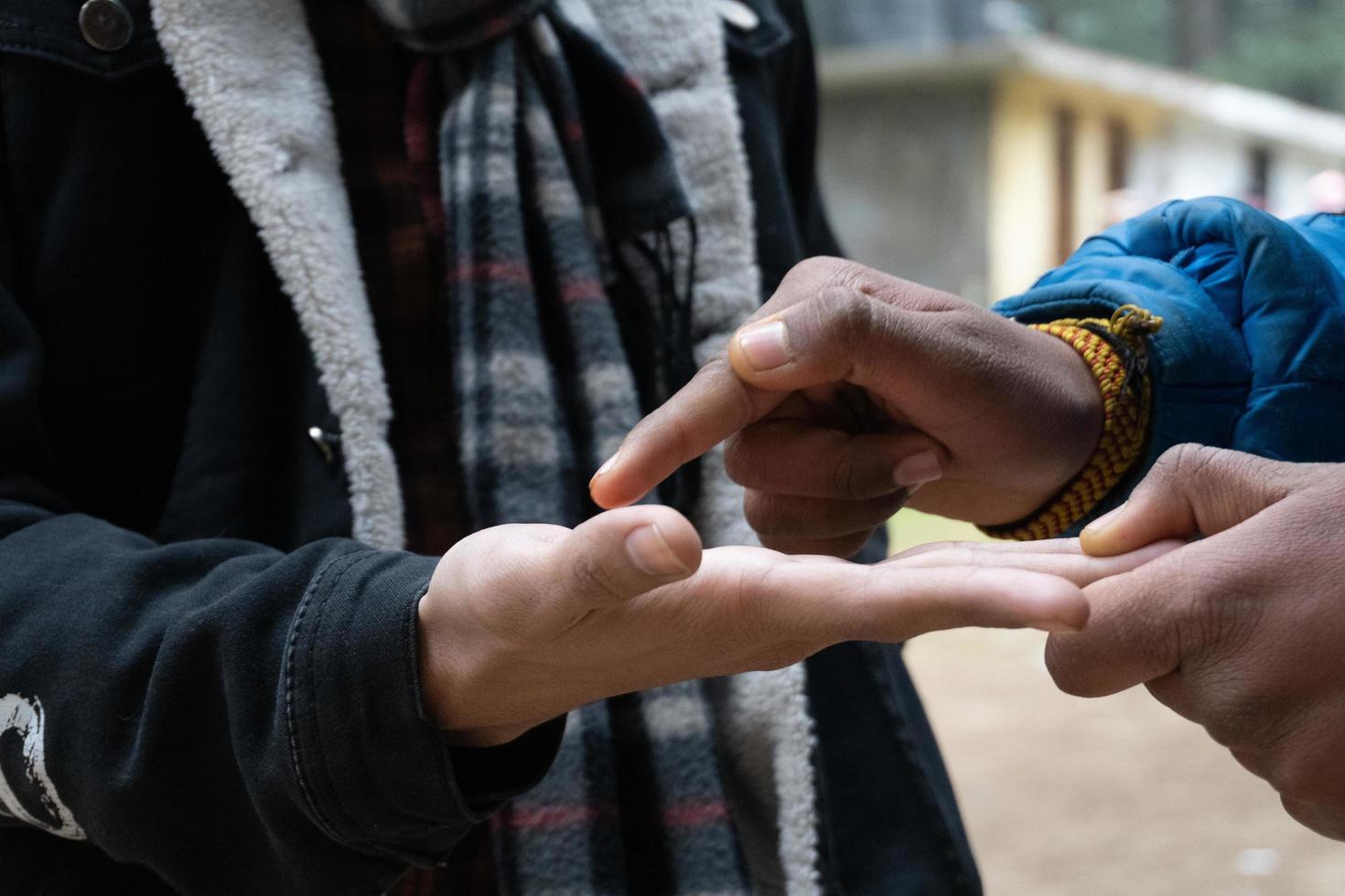 someone predict something about our future by watching hand photo