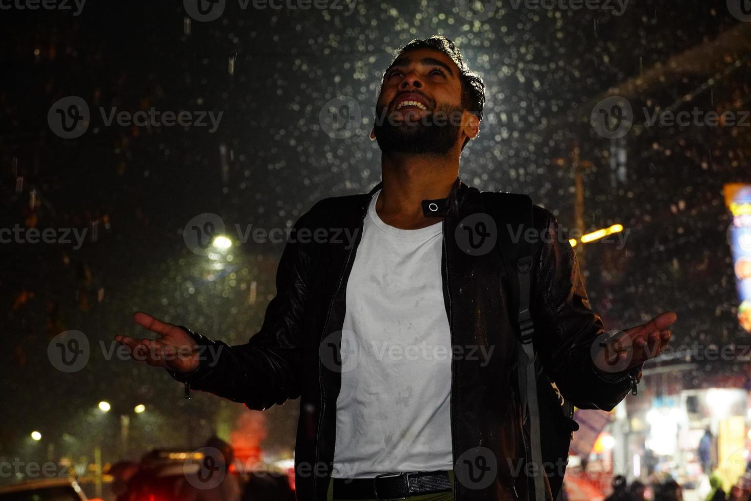 A man enjoying in snowfall photo