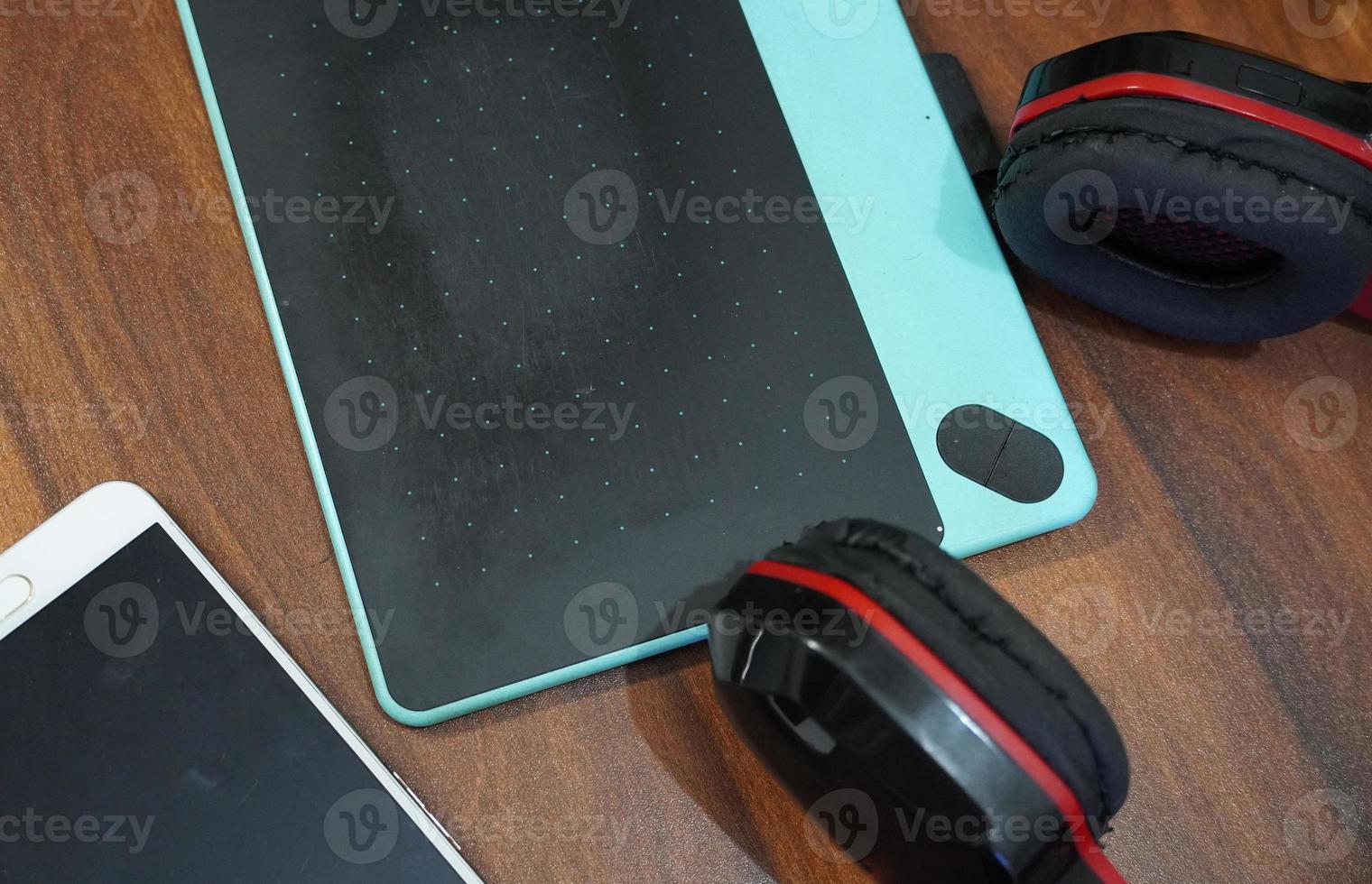 pen tablet headphone image photo