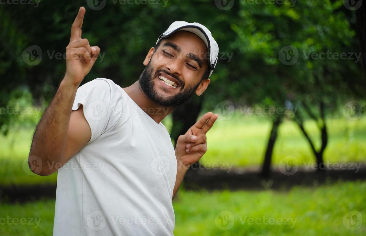 man enjoying and thinking using a gun in his imagination photo