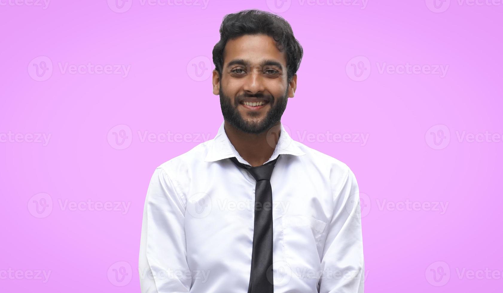 A man Smillling in Front of camera Isloted Background photo