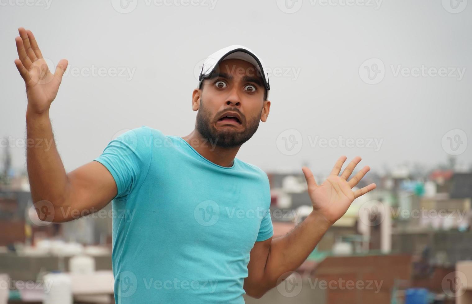 portrait of a handsome man shocked photo