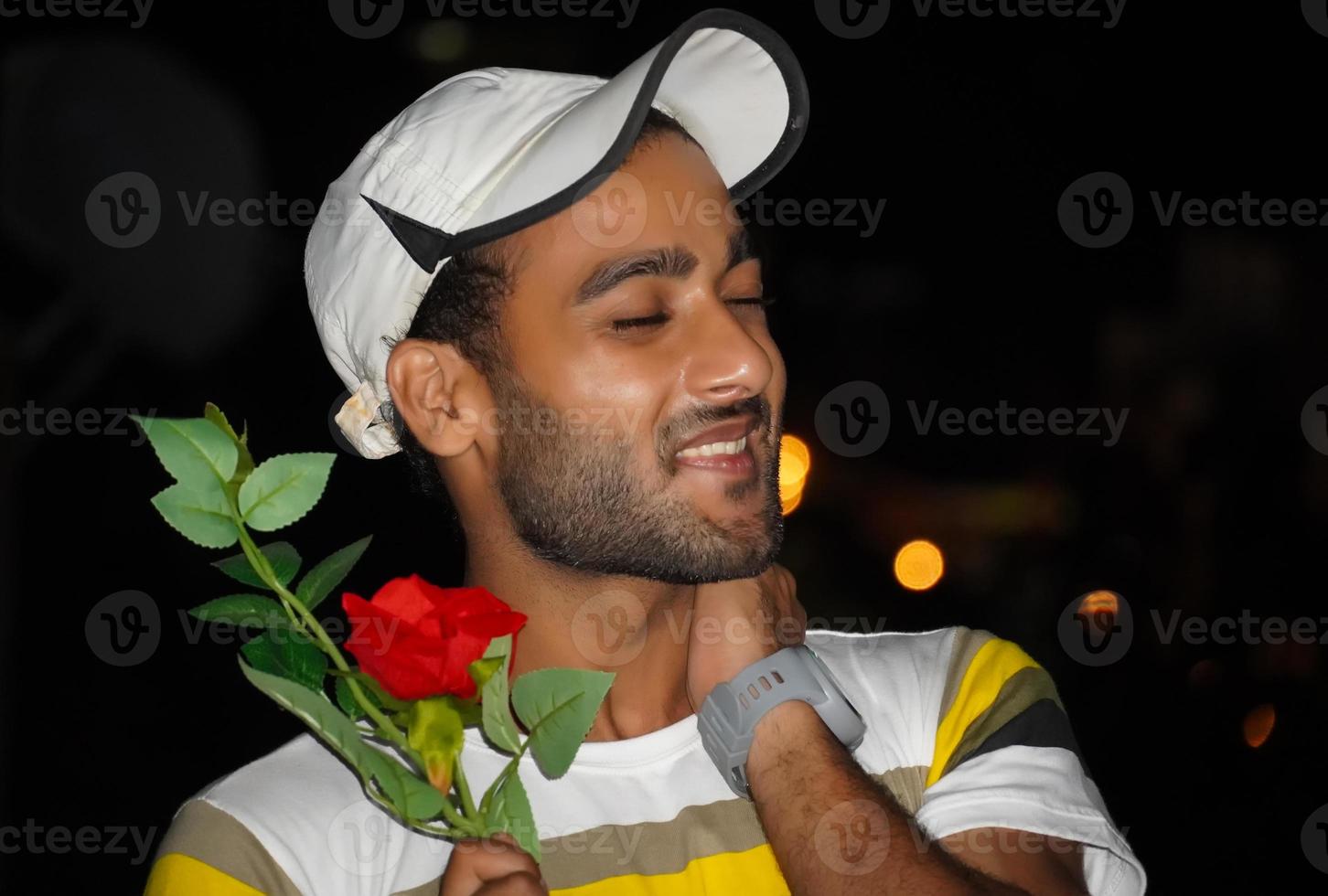 a boy with rose going to Propose his lover and exited photo
