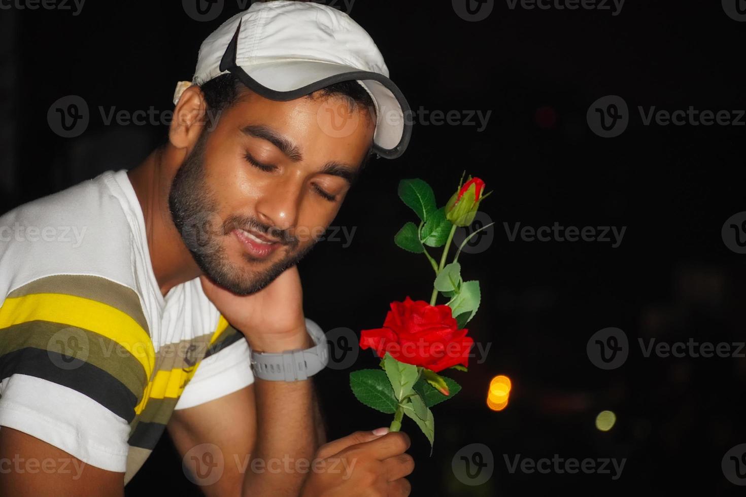 a boy with rose going to Propose his lover Day photo