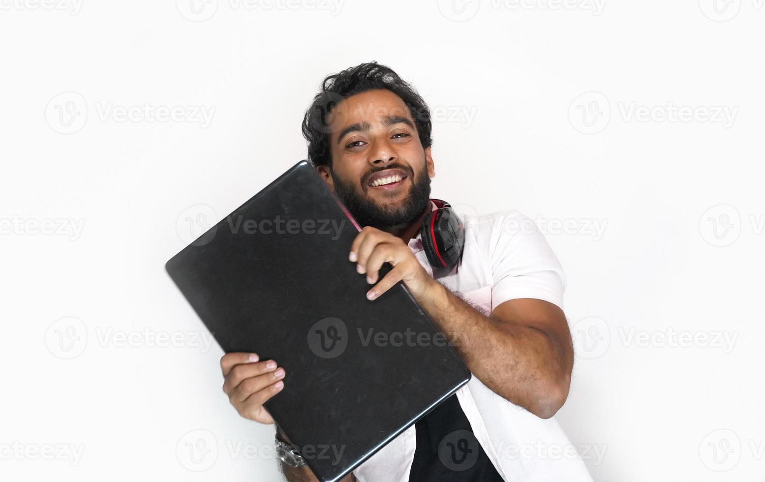 Young Boy with Laptop and smiling - education concept photo