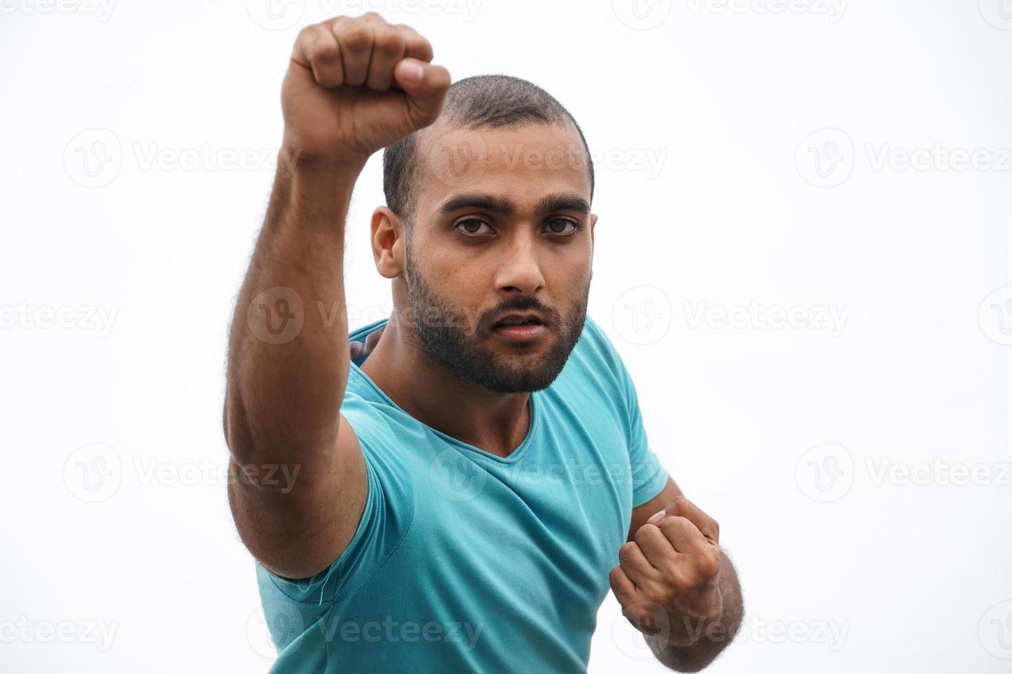 a man hitting using his punch photo
