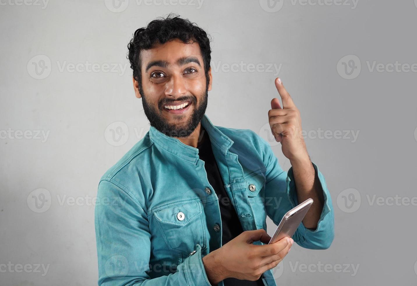 a man having mobile white background photo