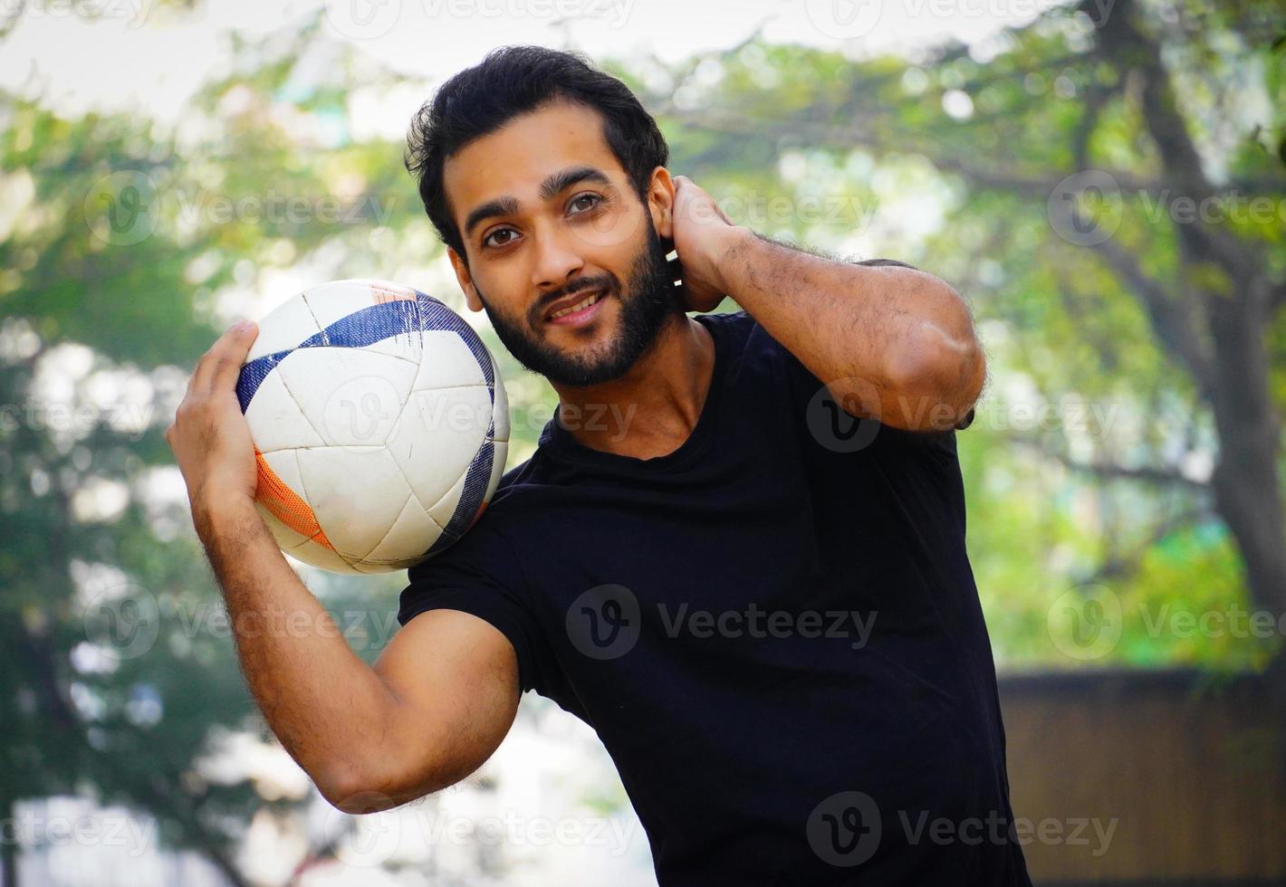 Young football player at the football Ground indian man image photo