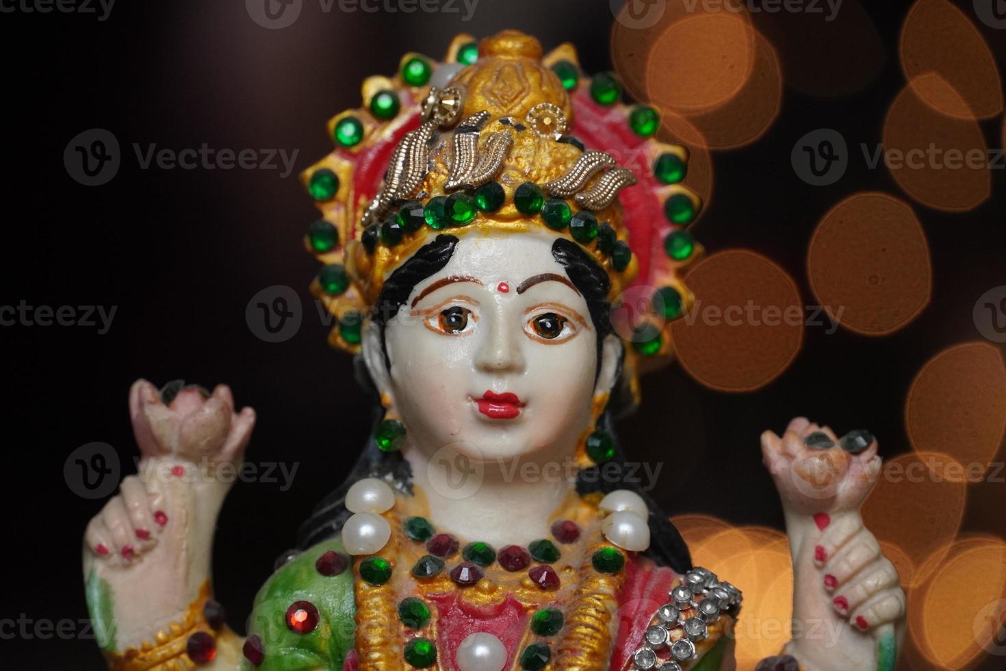 maa laxmi devi pooja image statue n diwali night photo