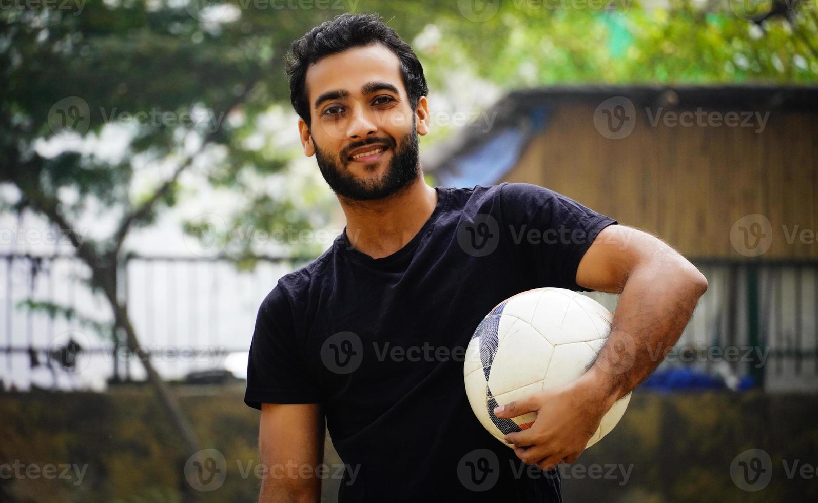 boy with football photo