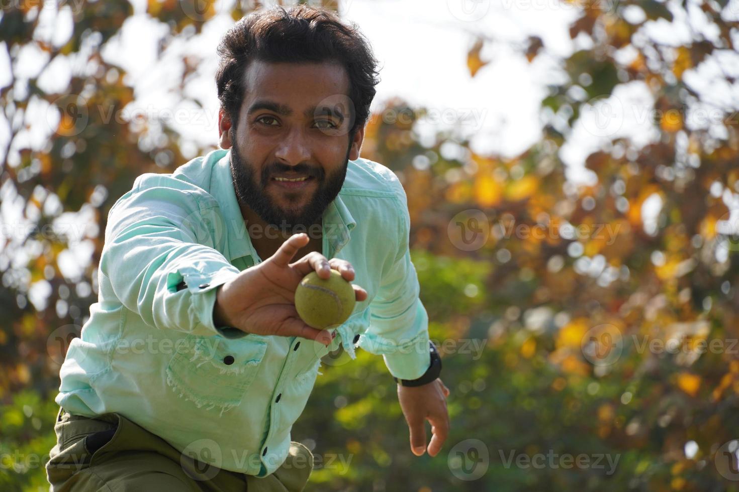 Indian bowler in exiting expression after catching ball in cricket match photo