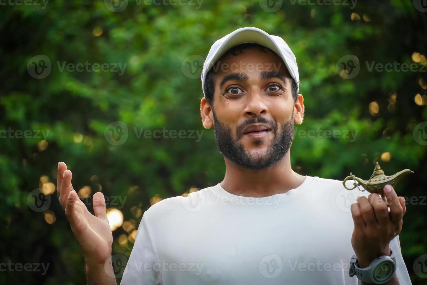 man with magic lamp image photo
