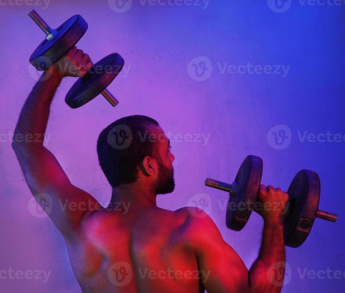 Man Lifting Weights Pictures dark light photo